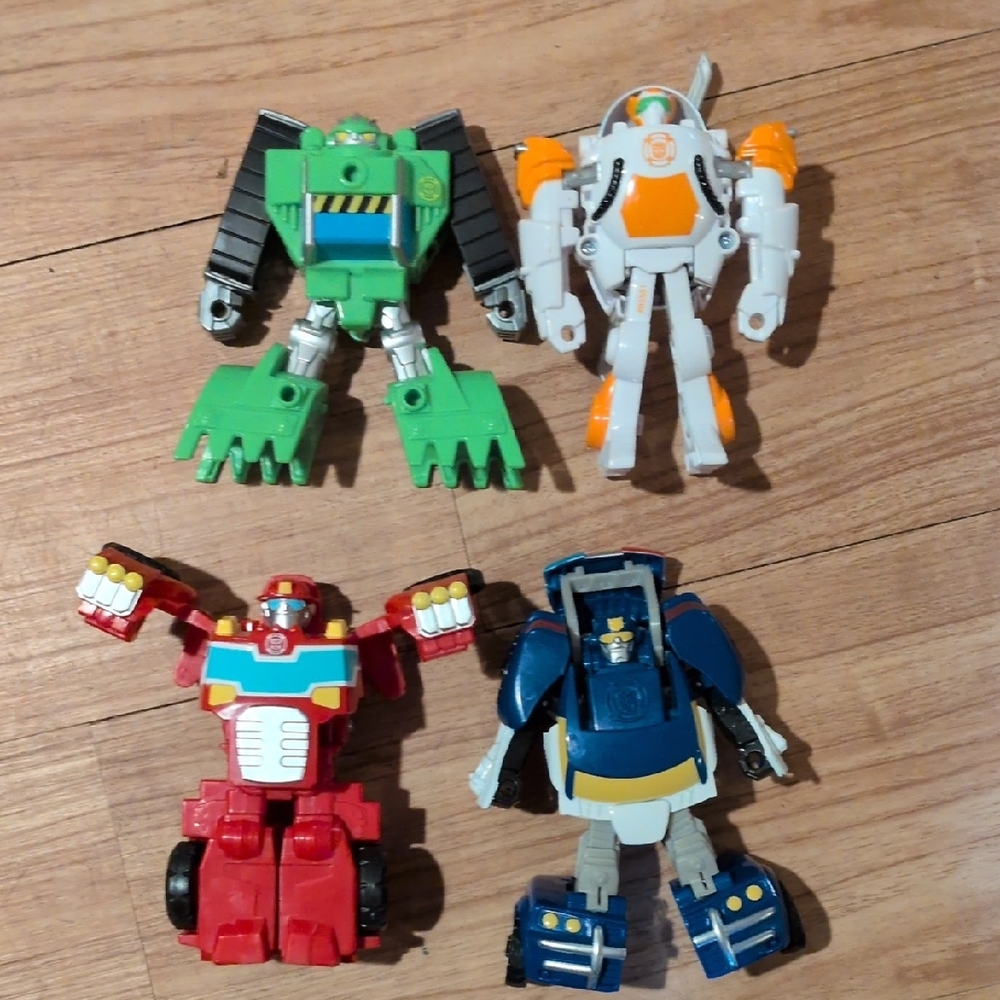 Hasbro Transforming Vehicle Set - Red, Green, Blue, Orange - Picture 2 of 6